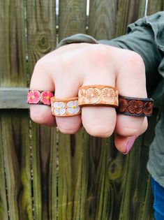 Handmade genuine tooled leather ring in your choice of color Collect and stack them for a fun statement! Each ring is made to order, so variations will occur but your ring(s) will be similar to the photos Thanks for shopping @boholeathercraft follow me on Instagram for updates & occasional promo codes! Diy Leather Rings, Leather Rings, Sodalite Jewelry, Hippie Rings, S Ring, Womens Ring, Ring Flower, Nature Earrings, Leather Ring