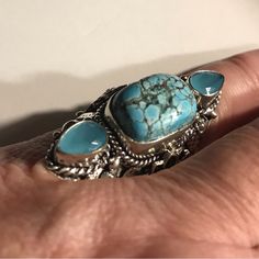 This Stunning 925 Sterling Silver Turquoise Ring Is Beautiful. 925 Sterling Silver. Size 7 20 Carats Of Turquoise Stones. 4 Carats Of Chalcedony Stones. Turquoise And Wealth. Turquoise Has Long Been A Symbol Of Luxury And Wealth. Wherever This Gemstone Is Found, It Is Always Symbolic Of Abundance. All Of My Listings Are Authentic Jewelry. “Stamped” 925 On The Back Of Jewelry. Tags. 100% Authentic Real Stones. 925 Sterling Silver, Necklace, Ring, Bracelet, Cuff Bracelet, Earring. Midcentury, Vint White Gold Diamond Band, Silver Turquoise Ring, Mystic Topaz Ring, Tanzanite Diamond Ring, Sterling Silver Rings Turquoise, Gold Diamond Band, Chalcedony Stone, Chalcedony Ring, Jewelry Tags