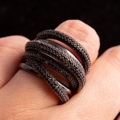 Elevate your style with this striking Elegant Black Cubic Zirconia Multi-Band Copper Women's Ring. This eye-catching piece features a unique multi-band design, meticulously encrusted with shimmering black cubic zirconia stones that add a touch of luxury to any outfit. Crafted from high-quality copper with a sleek black finish, this ring offers both durability and elegance. Whether you're dressing up for a special occasion or adding a bold statement to your everyday look, this ring is the perfect Cocktail Fashion, Band Design, Black Ring, Black Polish, Everyday Accessories, Fashion Ring, Ring For Women, Black Rings, Stone Settings