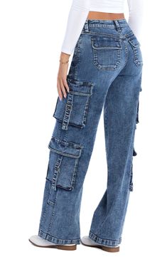 Classic cargo pockets give utilitarian appeal to these straight-leg jeans cut from soft low-stretch denim. 32" inseam; 22 1/2" leg opening; 11" front rise; 15" back rise Zip fly with button closure Front scoop pockets; coin pocket; back snap-flap patch pockets; cargo flap-bellows pockets 95% cotton, 4% polyester, 1% spandex Machine wash, tumble dry Imported Blue Straight Leg Utility Cargo Jeans, Dark Wash Denim Bottoms With Flap Pockets, Relaxed Fit Straight Leg Cargo Jeans With Flap Pockets, Dark Wash Straight Leg Bottoms With Flap Pockets, Dark Wash Denim Flare Jeans With Cargo Pockets, Blue Straight Leg Cargo Jeans With Multiple Pockets, Denim Blue Straight Leg Jeans With Multiple Pockets, Dark Wash Denim Flare Jeans With Multiple Pockets, Straight Leg Jeans With Multiple Pockets In Denim Blue