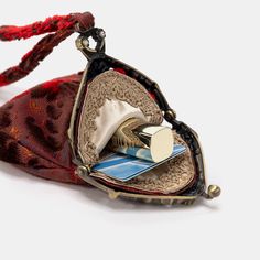 Introducing our exquisite Chatelaine Small Wristlet Purse, designed for those seeking a compact and stylish accessory.With a frame width of 3.15" and a height of 5", this small purse offers a charming and minimalist silhouette. Please note that the storage space is limited due to the unique shape of the frame.Inside the purse, you'll find a small pocket with a bottom width of 1", providing a convenient space for storing keys, coins, or lipsticks. The accompanying 6" wristlet strap is crafted from the same fabric as the body, adding a touch of elegance to this compact purse.Please be aware that the Chatelaine Small Wristlet Purse is designed to hold small items only and cannot accommodate a phone or passport. It is perfect for those occasions when you need to carry just the essentials in a Large Travel Bag, Work Tote Bag, Mens Travel, Mens Travel Bag, Work Tote, Wristlet Purse, Chatelaine, Garment Bags, Eyeglass Case