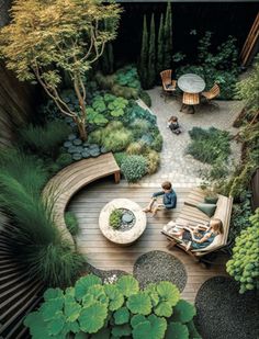 an aerial view of a garden with people sitting on chairs and tables in the center