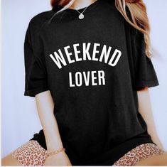 "Weekend Lover Shirt Weekend T Shirt Vacation Shirt Funny Shirt Friday Shirt Girls trip shirt Plus Size Shirts Fall in love with this soft and cozy Weekend lover Graphic Tee, Sweatshirt or hoodie PLEASE READ ENTIRE DESCRIPTION BEFORE PURCHASING TO MAKE YOUR SHOPPING EXPERIENCE EASIER, YOU CAN \"CHOOSE\" A T SHIRT, SWEATSHIRT OR HOODIE IN THIS LISTING. Available in Shirt, Sweatshirt and Hoodie Tee Shirt Shirt Sleeve Unisex fit Crewneck 100% Cotton Sweatshirt and Hoodies Long Sleeve Unisex fit Sof Trendy Tops For Weekend Wear, Weekend Crew Neck Top With Text Print, Weekend Text Print Crew Neck Top, Trendy Short Sleeve T-shirt For Weekend, Oversized Letter Print Top For Weekend, Weekend Relaxed Fit Crew Neck T-shirt, Casual Letter Print Tops For The Weekend, Weekend Crew Neck Tops With Graphic Print, Weekend Graphic Tee With Crew Neck