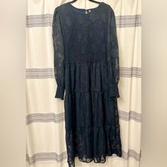 This Is An Xl Women’s Dress In Perfect Condition Never Worn. It Is A Polyester Blend And Is Machine Washable. This Elegant Dress Features A Dark Navy Blue Color With Intricate Floral Patterns Throughout. The Top Of The Dress Is Smocked, Creating A Fitted And Textured Look, While The Skirt Is Tiered For Added Volume And Flow. Long, Sheer Sleeves With Smocked Cuffs, Providing A Delicate And Feminine Touch. Round Neckline With A Keyhole Button Closure At The Back. This Dress Is Ideal For Both Casua Blue Lace Maxi Dress With Long Sleeves, Blue Long Sleeve Lace Maxi Dress, Blue Lace Long Sleeve Maxi Dress, Blue Long Sleeve Lace Midi Dress, White Tweed Dress, Dark Navy Blue Color, Dresses Navy Blue, Pleated Shirt Dress, Shein Dress