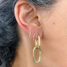 This versatile dangle hoop earrings is composed of 14K solid gold and feature a secure hinged closure for the ease of taking them on and off. The lower link can also be removed and worn as desired. Earring Dimensions: approximately 1.5" (L) x 0.5" (W); i.e. 38mm (L) x 13mm (W) Weight: approximately 4 grams of 14K solid gold for the pair Backing Type: Latch Back Metal Finish: High Shine Polish This design is currently only available in 14K Yellow Gold Please note that this item takes about 3 to 5 Yellow Gold Oblong Hoop Earrings, Yellow Gold Oval Hoop Earrings With Ear Wire, Yellow Gold Oblong Earrings, Earrings Cartilage, Tragus Conch, Elongated Oval, Dangle Hoop Earrings, Affordable Gifts, Cartilage Earrings