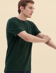 Simplicity at its best; our Pique fabric crew neck t shirt is impeccably crafted from the material that we traditionally used for our Polo Shirts - it drapes handsomely. The streamlined design has a mid-weight feel ideal for wearing on its own or layered under jackets.

Crafted from our premium Pique fabric — superfine two-fold yarn (60/2), made with the finest extra long staple Peruvian Pima cotton (100%).

We recommend that you take your normal size.

Machine wash warm without bleach. Gently t Green Cotton T-shirt For Layering, Green Relaxed Fit T-shirt For Layering, Green Short Sleeve T-shirt For Layering, Luxury Green Relaxed Fit T-shirt, Green Relaxed Fit T-shirt With Pockets, Outdoor Relaxed Fit T-shirt With Pockets, Green Cotton T-shirt For Hiking, Green Military Crew Neck T-shirt, Pima Cotton