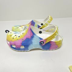 Crocs Women's Classic Tie-Dye Graphic Clog - White/Multi NWT 9 Men/11 Women. Casual Multicolor Non-slip Clogs, Spring Multicolor Non-slip Clogs, Multicolor Slip-on Casual Clogs, Casual Multicolor Clogs For Summer, Casual Multicolor Summer Clogs, Multicolor Beach Clogs For Spring, Multicolor Clogs For Beach In Spring, Casual Yellow Clogs For Beach, Casual Yellow Clogs For The Beach