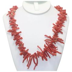 Vintage necklace that presents dyed coral stones. The necklace is 20 inches long and been inspected for authenticity by a professional. Single Strand Red Coral Necklace, Coral Necklace With Lobster Clasp In Red Coral, Coral Necklace With Natural Red Coral Stones, Coral Beaded Necklace With Lobster Clasp, Coral Gemstone Bead Necklace In Red Coral, Red Coral Gemstone Beads Necklace In Coral, Wedding Necklaces, Marquise Ring, Coral Stone