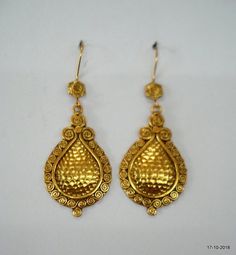 ethnic sterling silver gold vermeil gold gilded earring pair from rajasthan india. nice handmade design good for jewelry collection. long max.- 7.5 cm(2.95")width max.- 2.9 cm(1.14")weight - 23 gramsmaterial - Good Silver with gold plate. Festive Gold Bridal Earrings Made Of Brass, Luxury Gold Danglers With Tilla, Gold Brass Bridal Earrings For Festive Occasions, Gold Drop Earrings In Temple Jewelry Style, Gold Temple Jewelry Earrings For Ceremonial Occasions, Gold Temple Jewelry Drop Earrings, Gold Temple Jewelry Style Drop Earrings, Handmade Gold Bridal Earrings In Brass, Gold Chandbali Danglers