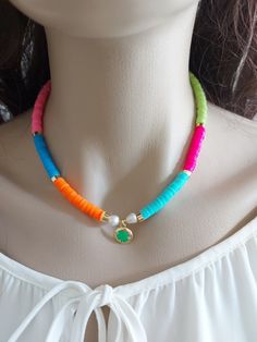 Colorful necklace is an excellent and elegant gift for your lovelies. Heishi necklace is made of colorful heishi bead and gold plated shamrock apparatus. You can wear the beach necklace to a wedding party and look very special. Pearl necklace is a nice Christmas gift, Valentine's Day gift, wedding gift, birthday gift, bridesmaid gift and other special day gift for her. Your beach necklace will be put in a nice tulle sachet. Heishi Beads Strand Necklaces As Gift, Multicolor Strand Necklace As Gift, Multicolor Strand Necklace For Gift, Colorful Heishi Bead Necklaces For Gifts, Heishi Bead Necklace With Heart Beads Gift, Gift Necklace With Heart Heishi Beads, Colorful Bead Strand Necklace For Gift, Collier Heishi, Pearl Necklace Colorful