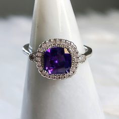 Ryze Royal Purple Cubic Zirconia .925 Sterling Silver Ring Main Stone: Royal Purple Cz Accent Stone: White Frost Cz New With Tags! Size: 10 Msrp: $238 Silver Jewelry With Accent Stones In 14k White Gold, Classic Crystal Ring With Cubic Zirconia, Fine Jewelry Cubic Zirconia Birthstone Ring With Halo Setting, Cubic Zirconia Birthstone Ring With Halo Setting, Promise Halo Ring With Gemstone In Sterling Silver, Silver Promise Jewelry With Halo Design, Silver Jewelry With Halo Design For Promise, Dazzling Sterling Silver Crystal Ring In White Gold, Sterling Silver White Gold Halo Crystal Ring