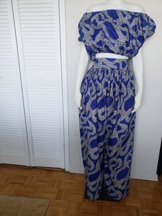 **PLEASE DO NOT HESITATE TO CONTACT US FOR ANY MEASUREMENT INQUIRIES** SIZE: M: W 28, Bust 36, Pant Length 45-46 This High Waisted Palazzo Pant and Off Shoulder Crop Top is simply gorgeous  An Excellent addition  to your collection.  Great Quality, Stylish, and Classy Ready to Wear Outfits for your style Confidence Casual Blue Two-piece Bottoms, High Waist Blue Harem Pants For Spring, Stretch Wide-leg Two-piece Bottoms, High-waisted Blue Harem Pants For Summer, Blue Wide-leg Harem Pants With Elastic Waistband, Blue High-waisted Harem Pants For Summer, Blue High Waist Sets For Spring, Blue Stretch Harem Pants With Elastic Waistband, Casual Blue Sets With Elastic Waistband