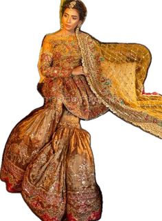 Golden Sharara Wedding Sharara With Gold Embroidery In Art Silk, Gold Fitted Sharara In Art Silk, Gold Wedding Sharara With Embroidered Border, Fitted Gold Sharara With Intricate Embroidery, Gold Wedding Sharara With Intricate Embroidery, Short Shirts