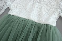 Home Spring Wedding Tutu Dress With Lace Patchwork, Spring Bridesmaid Princess Dress With Lace Trim, Spring Bridesmaid Tutu Dress With Lace Bodice, Green Ruffled Tutu Dress For Wedding, Elegant Green Tutu Dress For Spring, Spring Green Lace Dress For Wedding, Spring Wedding Green Lace Dress, Green Tulle Skirt Dress For Dress-up, Green Tulle Skirt Dress For Dress-up Occasions