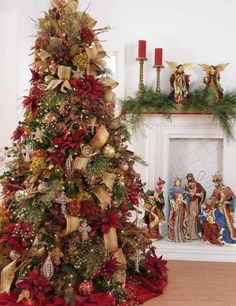 a decorated christmas tree in front of a fireplace