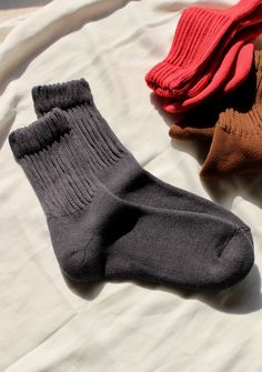 Meet the Na Nin FiFi Sock - a highly comfortable and durable sock for everyday wear, perfect for any season. With its elastic body and plush support, the FiFi offers a unique and versatile look, allowing you to wear it high or scrunched up to your own preference. Made in Japan Buy two, get one free. Add three pairs to cart and promotion will be automatically applied. Soft Solid Winter Socks, Winter Soft Solid Color Socks, Comfortable Thick Snug Socks, Comfortable Warm Solid Color Socks, Thick Solid Winter Socks, Warm Comfortable Plain Color Socks, Super Soft Solid Winter Socks, Soft Gray Casual Socks, Soft Gray Winter Socks