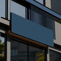 an image of a building that is blue and white with vertical lines on the side