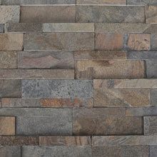 a stone wall that is made out of several different types of stones, including brown and tan