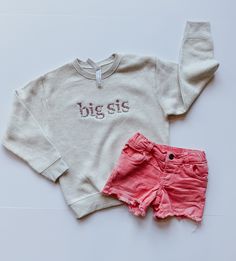 This sweet sister sweatshirt is embroidered with beautiful floral details.  This shirt is perfect for any little girl whether they are already a sister or are about to become one. This cozy sibling sweatshirt can be paired with one of our baby announcement signs to provide the perfect announcement that you are adding to your family! Important Details: For sizes 2T - 7:  Sweatshirt is 60/40 cotton/polyester fleece For sizes 6-12 months - 18-24 months:  Pullover is 100% cotton.  This is a soft lig Cute Cotton Sweatshirt With Embroidered Logo, Cute Embroidered Relaxed Fit Tops, Cute Embroidered Tops With Relaxed Fit, Cute Cotton Sweatshirt With Custom Embroidery, Cute Tops With Embroidered Text For Fall, Cute Embroidered Text Tops For Fall, Cute Spring Tops With Embroidered Logo, Spring Tops With Custom Embroidery, Cute Cotton Sweatshirt With Embroidered Graphics