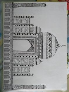 a drawing of an ornate building in black and white on a sheet of paper with colored pencils