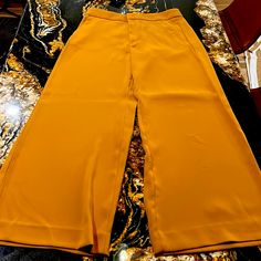 Caramel Colored Pant. High-Rise. Wide Leg. Washable Stretch. Machine Washable. Size 12. Zipper Front. Chic Mustard Wide Leg Pants, Orange Ankle-length Pants For Work, Orange Ankle-length Work Pants, Mustard High Waist Bottoms For Workwear, Mustard High-waist Bottoms For Work, Summer Workwear Mustard Bottoms, High Waist Mustard Bottoms For Work, Mustard Summer Workwear Pants, Chic Mustard Trousers