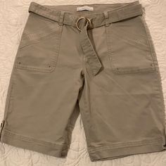 Cargo Style Bermuda Length Mid Weight Cotton Shorts With A Little Stretch. Comes With Belt Still Attached. Perfect Condition. Never Worn. Lots Of Detail On Pockets And Hem. Size 6. Color Khaki. Measurements In Pics. Will Consider Offers. Casual Short-length Capris With Pockets, Casual Short Length Capris With Pockets, Casual Short Capris With Pockets, Casual Capris With Built-in Shorts, Casual Bermuda Bottoms With Belt Loops, Mid-rise Cotton Bermuda Shorts With Pockets, Casual Capris With Built-in Shorts For Spring, Short Cotton Capris With Elastic Waistband, Spring Mid-rise Bermuda Shorts With Pockets