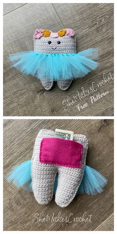 crocheted toothbrush holder with blue tulle and pink bottom, sitting on top of a wooden floor