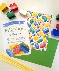 a birthday card with legos on it next to some rubber blocks and other crafting supplies