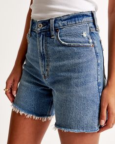 High rise with a relaxed fit throughout the hip and thigh, and a 5 inch (13 cm) inseam. Vintage stretch denim in a medium wash, with frayed hem. Dad Shorts, Back To School Fits, Baby Trend, School Fits, Summer Wardrobe, Stretch Denim, Abercrombie Fitch, Medium Size, Womens Bottoms