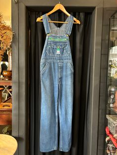 1990's Liberty denim overalls  Made in USA 100% Cotton Size - XS/S Measurements:- Waist - 28" or 71cm Button to button - 26" or 66cm Hip - 34"-36" Outer Leg (from waist) - 39" or 99cm Inner leg - 28" or 71cm Best fit size 6-8 Vintage Cotton Denim Jumpsuit With Button Closure, 90s Style Denim Jumpsuit With Pockets, Vintage Cotton Denim Jumpsuit In Medium Wash, Vintage Dark Wash Cotton Denim Jumpsuit, Retro Bib Front Overalls In Medium Wash, Retro Denim Bib Front Jumpsuit, Retro Denim Jumpsuit With Bib Front, Retro Medium Wash Bib Front Overalls, Vintage Denim Overalls In Medium Wash