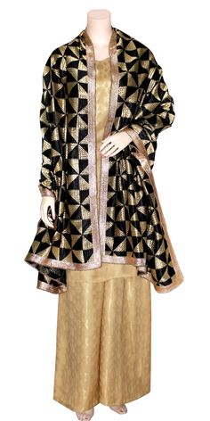 This stunning party wear 3-piece suit includes a golden shimmer silk long full sleeves kurti & palazzo pants along with a Baag Phulkari dupatta. The dupatta is designed in traditional hand embroidered Punjabi phulkari work. The pants come with a comfortable elastic waist band. A fashionable outfit for a special occasion! Fabric: Shimmer Silk Kurti & Palazzo with Taffeta lining Stitching: Fully Stitched Care: Dry clean recommended Message: Please feel free to contact us to customize this outfit or any other queries. Note: Product color may slightly differ from the image. Please note the we offer expediate shipping, that only speeds up the shipping time, our processing time will not be effected. Semi-stitched Traditional Wear For Celebration, Festive Unstitched Suit With Dabka And Traditional Drape, Festive Designer Semi-stitched Salwar Kameez, Gold Unstitched Suit For Eid, Party Dabka Sharara In Raw Silk, Party Kurta In Raw Silk With Dabka Detailing, Festive Raw Silk Unstitched Suit With Dabka, Festive Unstitched Chinon Suit With Dabka, Festive Unstitched Dabka Suit In Chinon