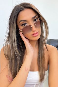 She's giving fun and chic! The Essex Sunglasses offer a Brown/ Blue gradient lens, no bordering frame and gold/ black hands. Match her with your go to fit this summer. Black Hands, Blue Gradient, Black Hand, Gold Black, This Summer, Sunglasses, Frame, Gold, Blue