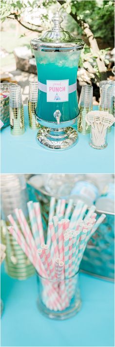 there are many cups with straws in them on the table and one is filled with paper straws