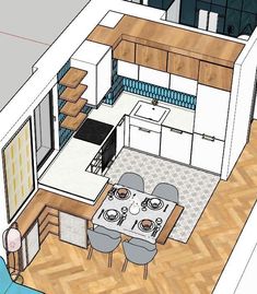 an overhead view of a kitchen and dining room in a small apartment with wood floors