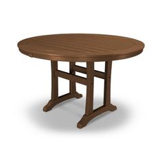 a wooden table with an oval top