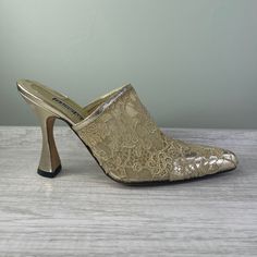 Gorgeous Vintage! Claudio Merazzi Metallic Gold Leather With Lace 3” Heel Pointed Toe Mules Made In Italy Size 6.5 Excellent Pre Owned Condition. Please See Photos For Signs Of Wear Gold Medium Width Slip-on Heels, Gold Slip-on Heels For Formal Occasions, Gold Slip-on Heels For Evening, Gold Heels For Spring Formal, Gold Heels For Formal Spring Occasions, Glamorous Slip-on Evening Heels, Glamorous Evening Slip-on Heels, Slip-on Evening Heels For Spring, Elegant Slip-on Heels For Evening