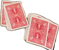 two red playing cards sitting on top of each other