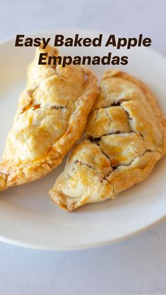 two baked apple empanadas on a white plate with the words easy baked apple empanadas