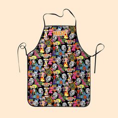 an apron with skulls and clowns all over it, on a beige background that says happy