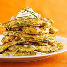 a stack of food sitting on top of a white plate