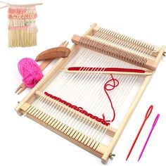 an image of a weaving machine with yarn and needles on the table next to it