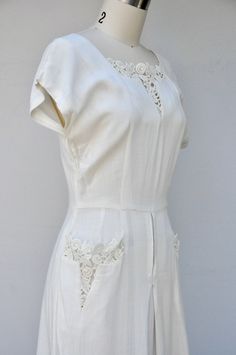 Formal White Dress With Pockets, Elegant White Dresses With Pockets, White Fitted Dresses With Pockets, White Fitted Dress With Pockets, 1950s Style Summer Wedding Dress, 1950s Vintage Summer Wedding Dress, 1950s Style White Short Sleeve Dress, Party Dress Simple, Mid Century Wedding