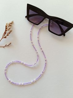 An elegant Eyeglass chain for your sunglasses or reading glasses. Approximately size of the chain is 65cm. It comes with a glasses connector that is removable. Sunglasses Strap Diy, Accessories Idea, Beaded Glasses Chain, Beaded Glasses, Glasses Chains, Sunglasses Strap, Purple Beaded, Chain For Women, Beaded Jewellery