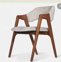 an image of a wooden chair with white fabric