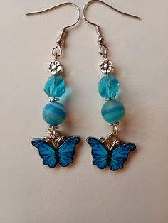 Turquoise butterfly dangle earrins Blue Butterfly Charm Dangle Earrings, Blue Butterfly Jewelry With Butterfly Print, Handmade Blue Butterfly Earrings, Blue Dangle Earrings With Butterfly Charm, Blue Butterfly Charm Earrings For Gift, Handmade Turquoise Butterfly Jewelry, Acrylic Nails Almond Shape, Turquoise Butterfly, Almond Acrylic Nails