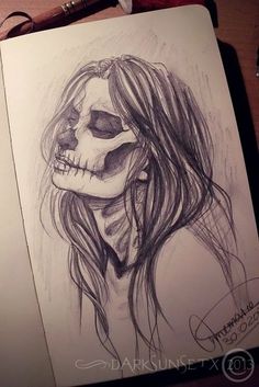 a pencil drawing of a woman's skull with long hair