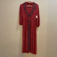 Free People. Maxi Dress Is Dark Red With Black Embroidered Floral Accents. Features A Tie Waist With Front Clasps . Perfect For A Beach Coverup. Red Floral Embroidered Dress For Fall, Spring Embroidered Red Midi Dress, Spring Red Embroidered Midi Dress, Flowy Rayon Dress With Floral Embroidery, Embroidered Long Dress For Fall, Long Embroidered Dress For Fall, Long Embroidered Dresses For Fall, Spring Red Maxi Dress With Floral Embroidery, Red Floral Embroidered Midi Dress