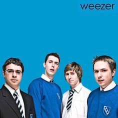 four young men in sweaters and ties posing for a photo with the word weezer on it