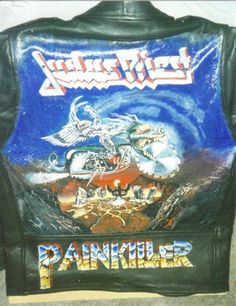 the back of a leather jacket with an image of a motorcycle on it