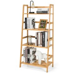 a wooden book shelf with books on it